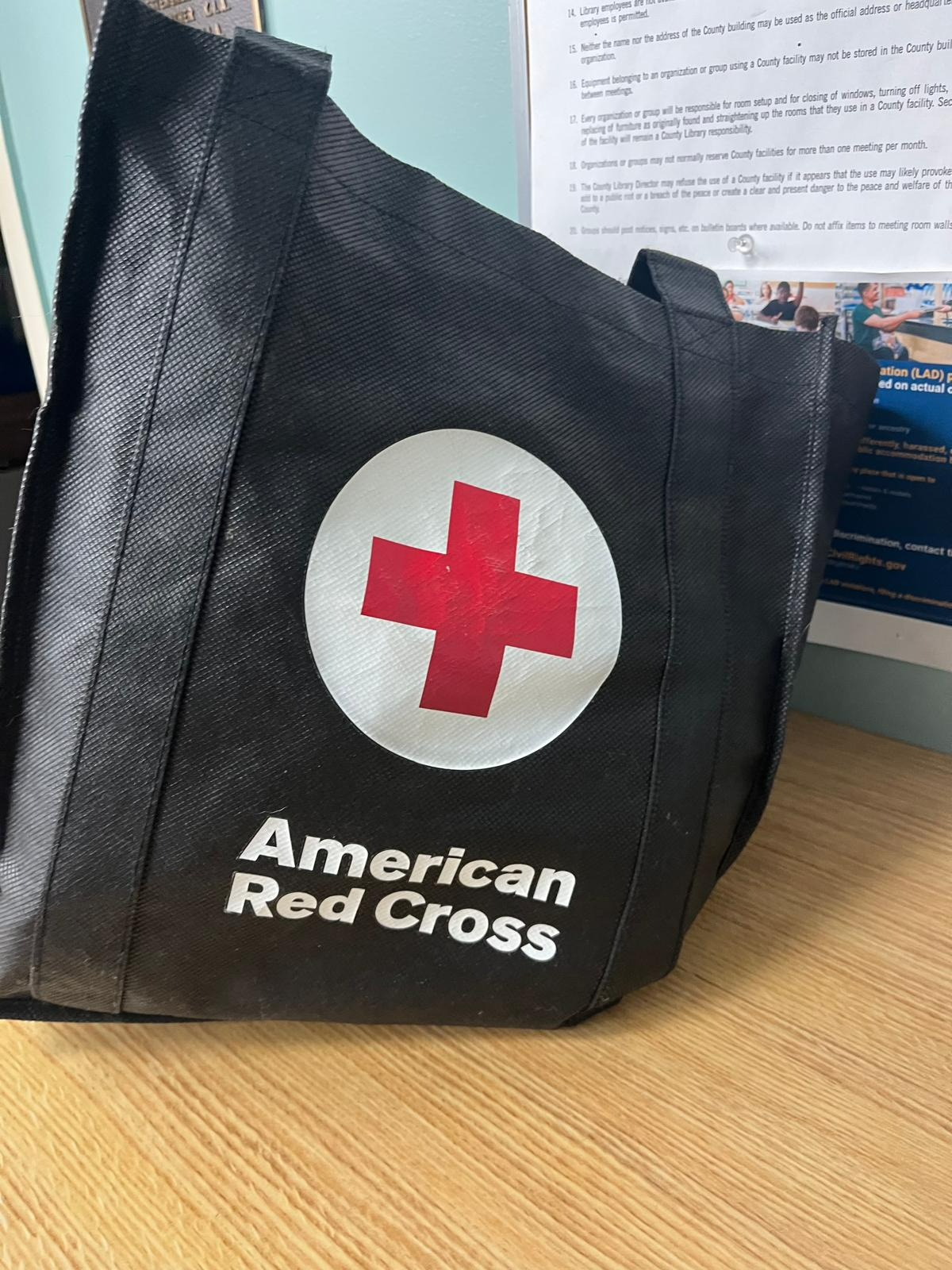 American Red Cross training supply bag at a county library class venue