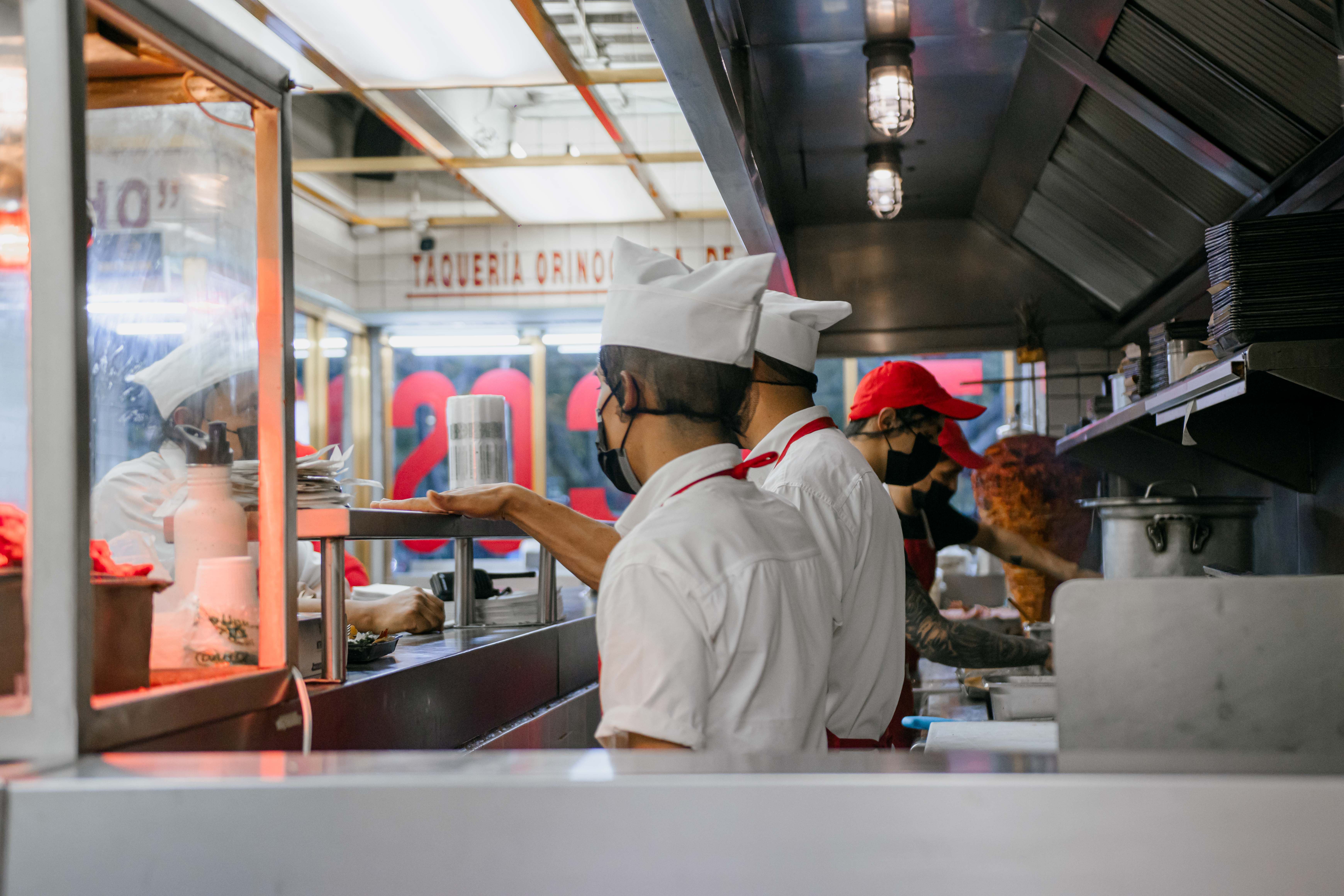 Restaurant staff working in a busy New Jersey kitchen